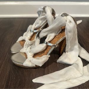 Bakers heals with lace tie around leg